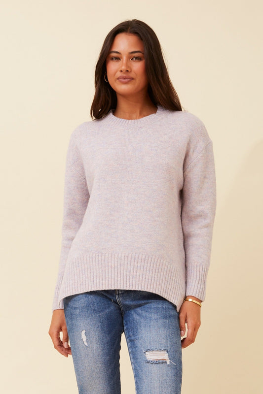 Image of a model wearing Outerwear. Product name - KAMARI WOOL BLEND KNIT PULLOVER in Multi Blue colour by brand - Caroline Morgan Australia