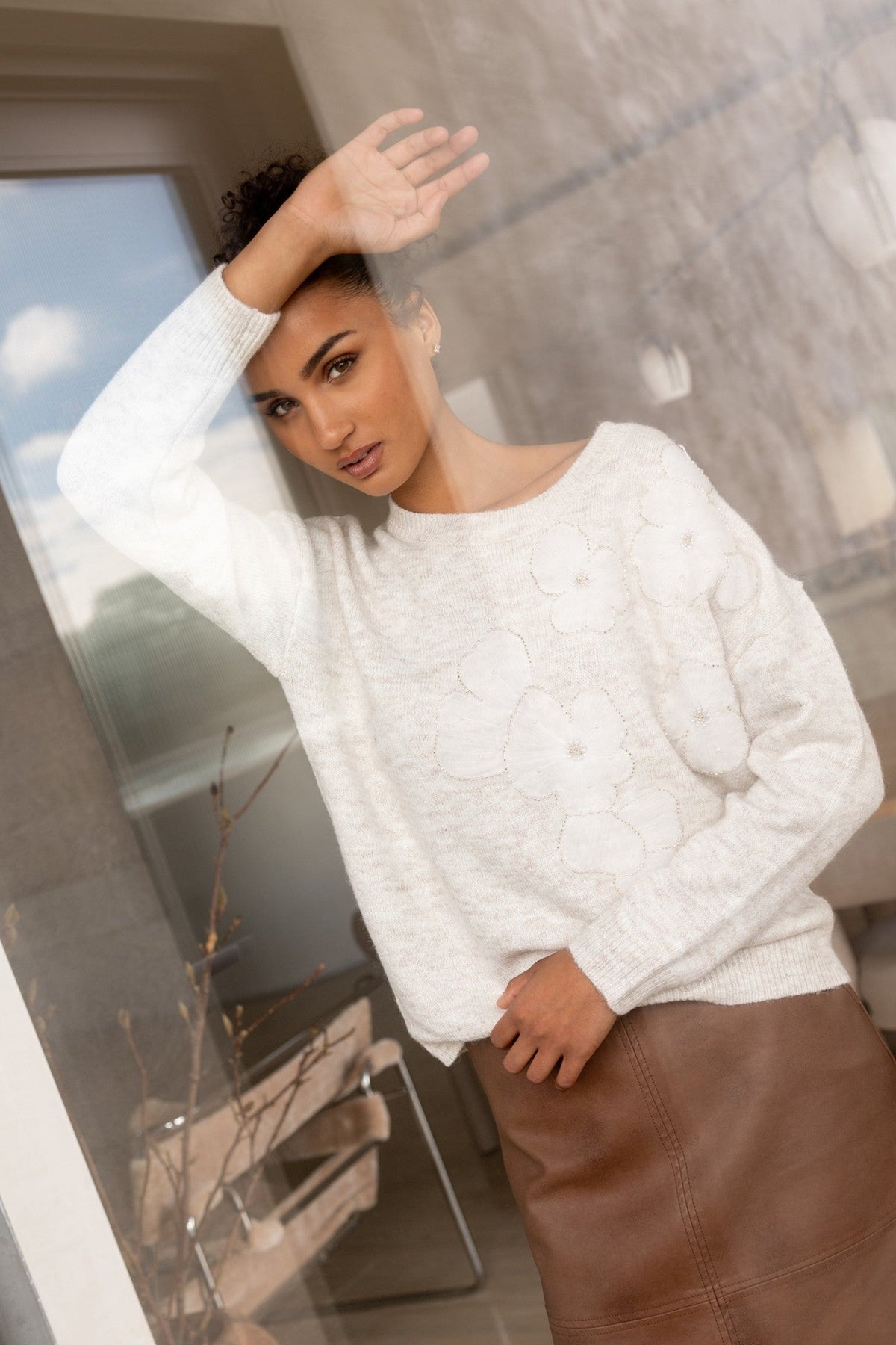 Image of a model wearing Outerwear. Product name - MARIN WOOL BLEND KNIT PULLOVER in Oatmeal colour by brand - Caroline Morgan Australia