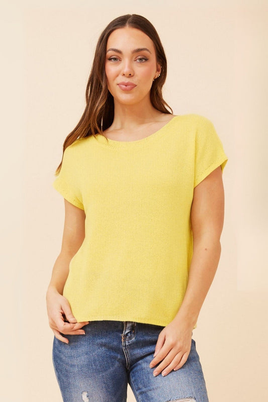 Image of a model wearing Tops. Product name - JOBETH SOLID KNIT TOP in Lemon Sorbet colour by brand - Caroline Morgan Australia