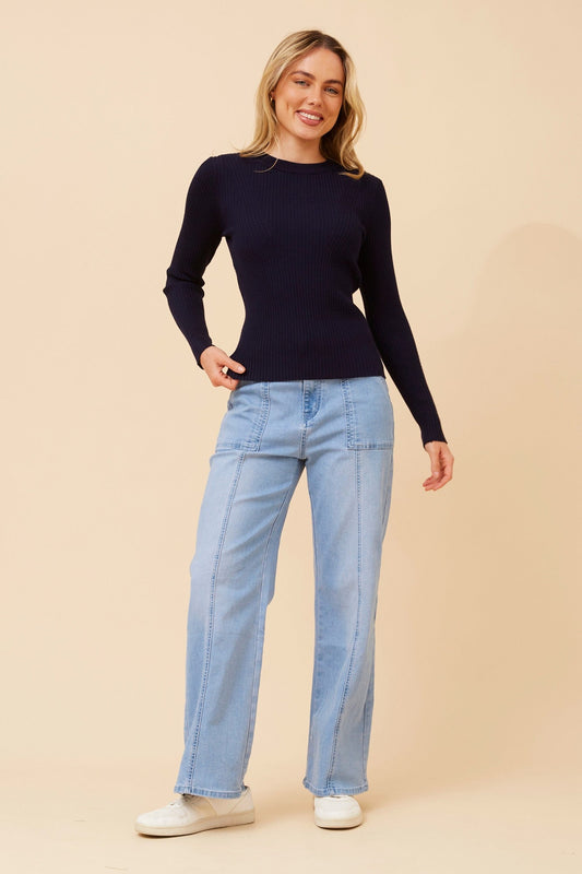Image of a model wearing Outerwear. Product name - CARLETTA SOLID KNIT PULLOVER in Navy colour by brand - Caroline Morgan Australia