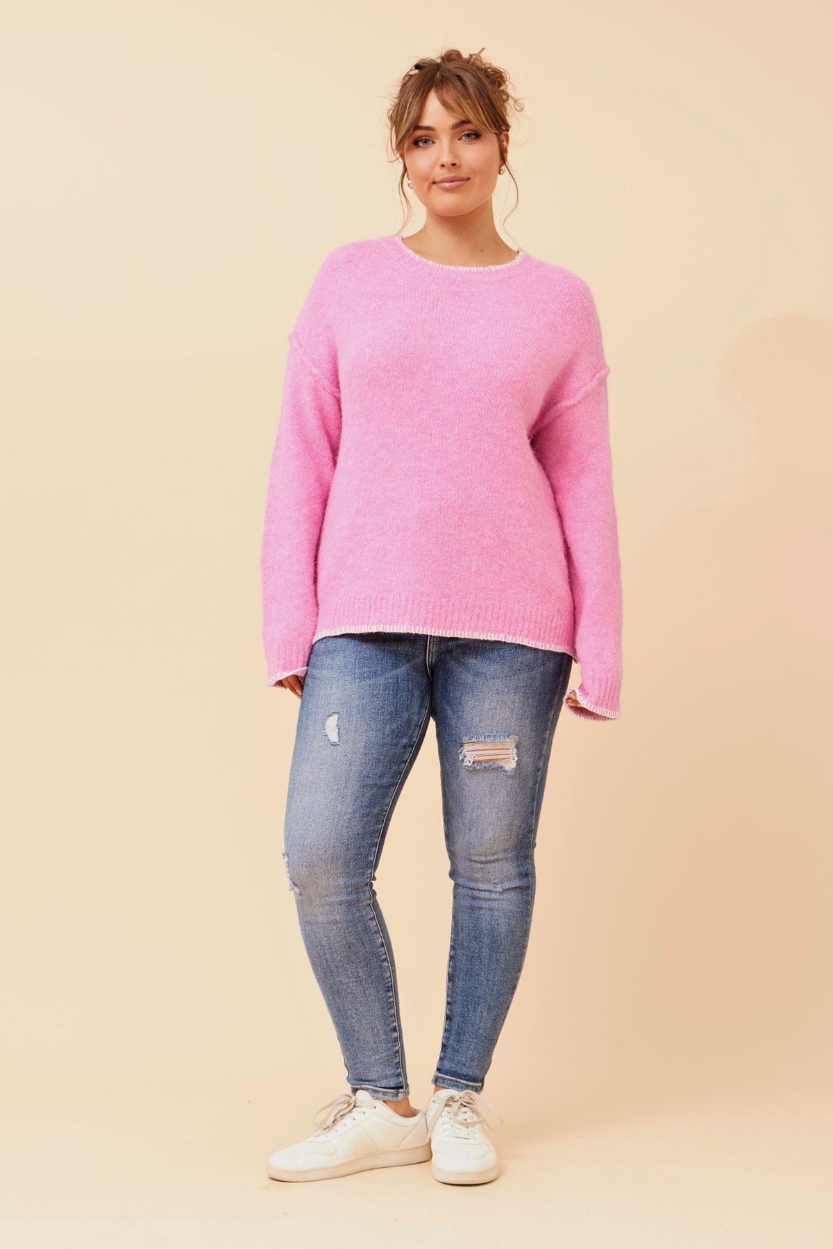 Image of a model wearing Outerwear. Product name - ABILENE WOOL BLEND KNIT PULLOVER in Chocolate colour by brand - Caroline Morgan Australia