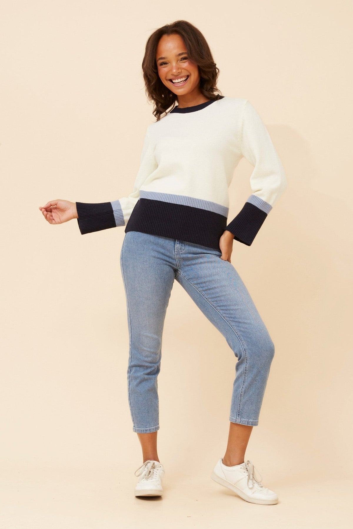 Image of a model wearing Outerwear. Product name - DIMONA COLOURBLOCK KNIT PULLOVER in Ivory colour by brand - Caroline Morgan Australia