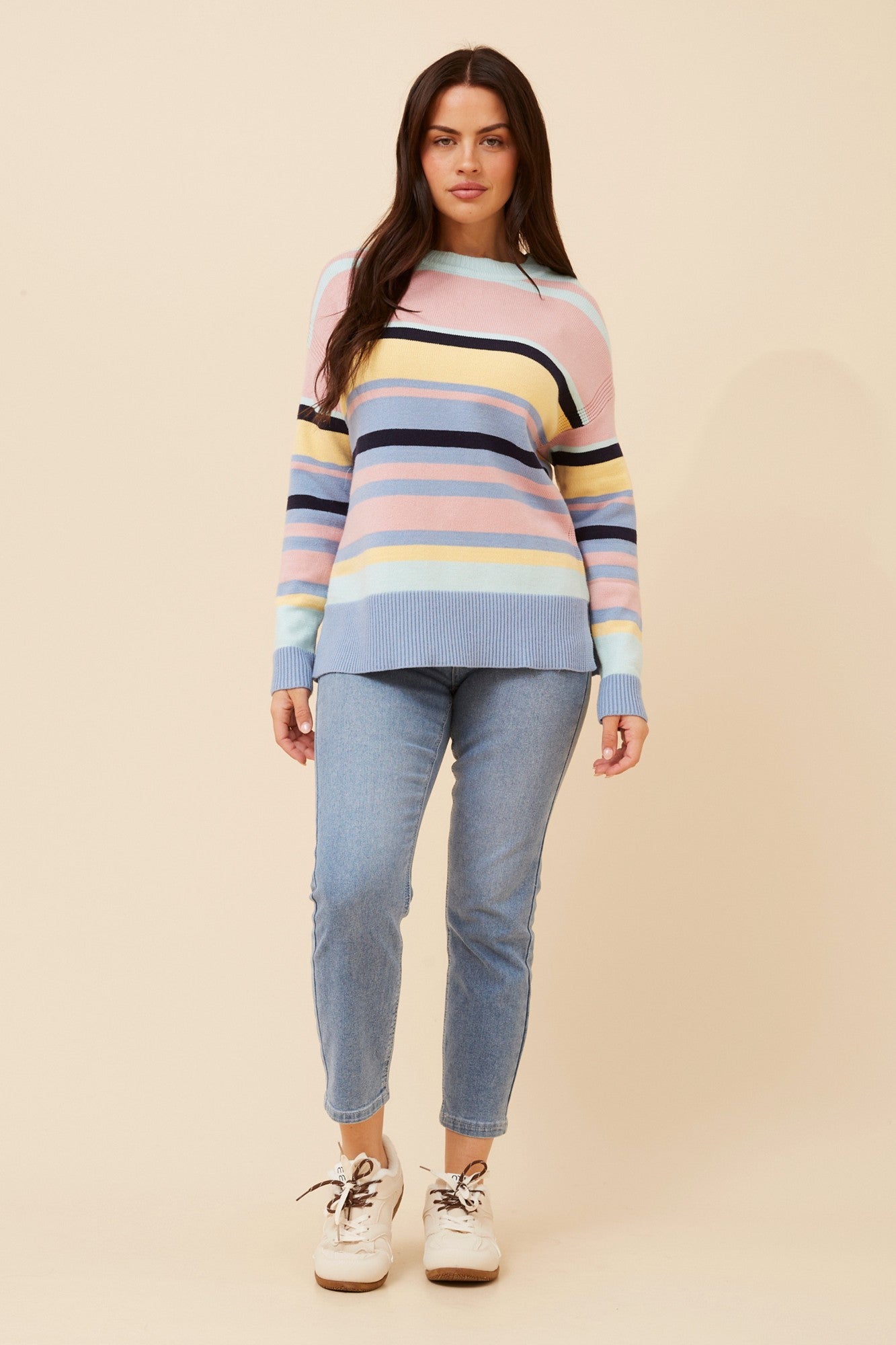 Image of a model wearing Outerwear. Product name - AMINTA STRIPE PRINT KNIT PULLOVER in Multi Blue colour by brand - Caroline Morgan Australia