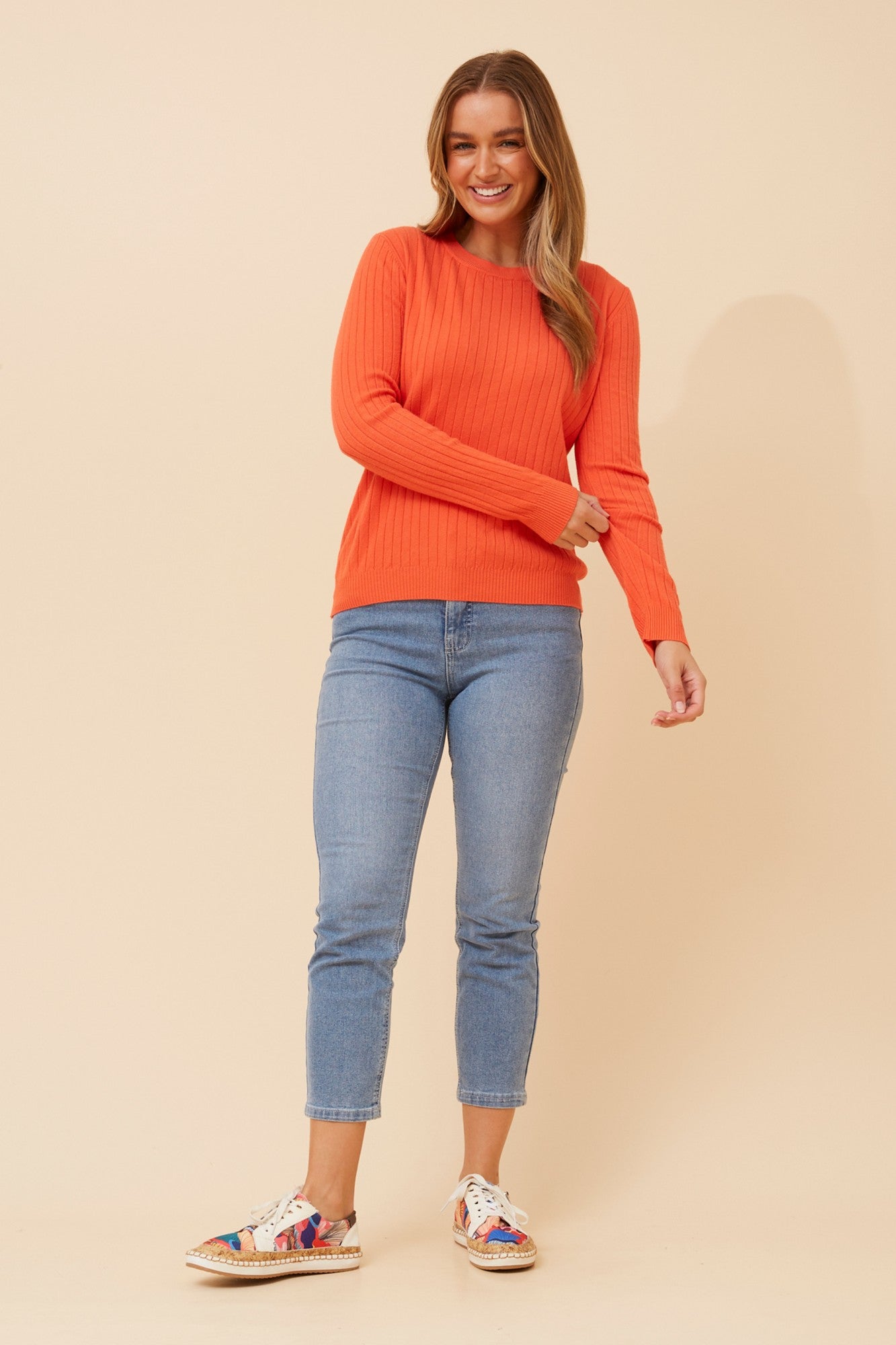 Image of a model wearing Outerwear. Product name - CATY SOLID KNIT PULLOVER in Emerald colour by brand - Caroline Morgan Australia