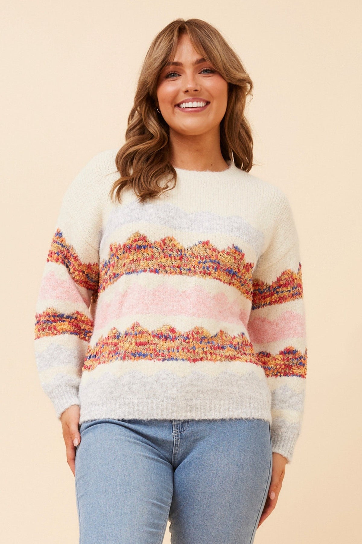 Image of a model wearing Outerwear. Product name - GALIA WOOL BLEND KNIT PULLOVER in Ivory colour by brand - Caroline Morgan Australia