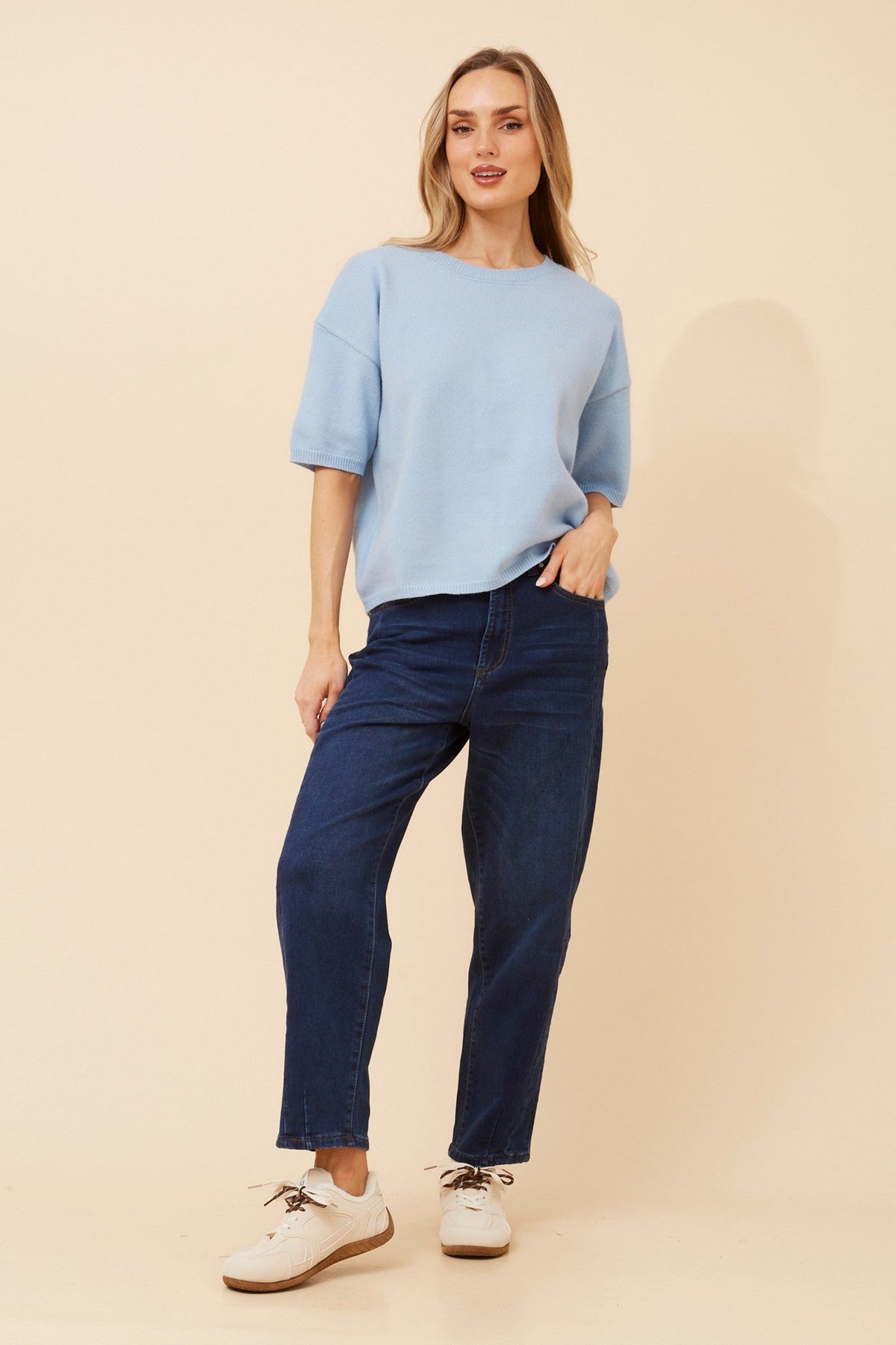Image of a model wearing Outerwear. Product name - GILBERT SOLID KNIT PULLOVER in Skylight colour by brand - Caroline Morgan Australia