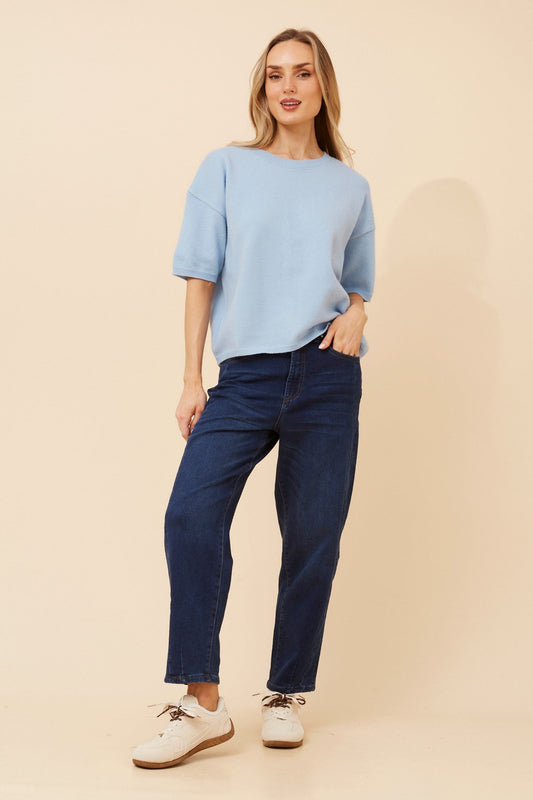 Image of a model wearing Outerwear. Product name - GILBERT SOLID KNIT PULLOVER in Skylight colour by brand - Caroline Morgan Australia