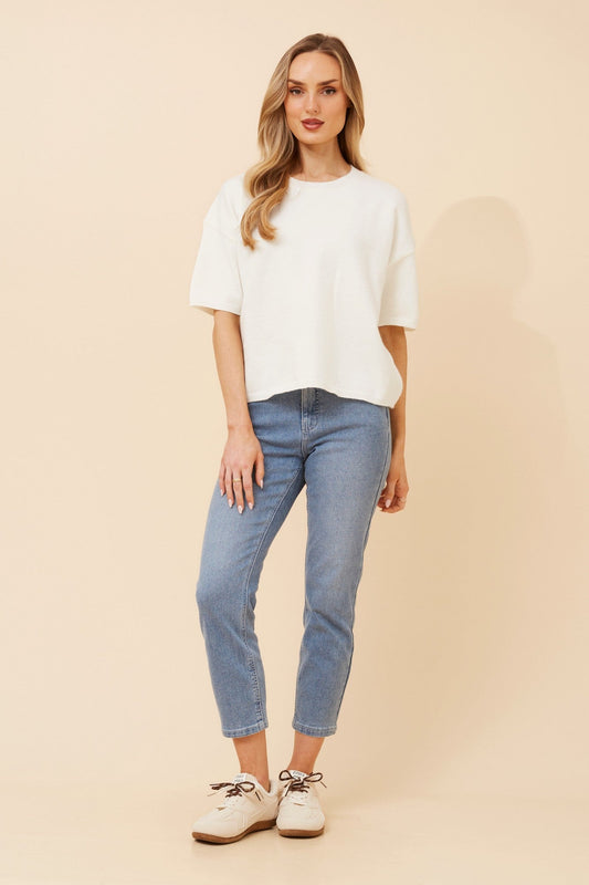 Image of a model wearing Outerwear. Product name - GILBERT SOLID KNIT PULLOVER in White colour by brand - Caroline Morgan Australia