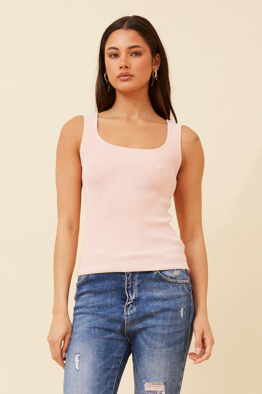 Image of a model wearing Tops. Product name - KIENNA SLEEVELESS KNIT TOP in Pink colour by brand - Caroline Morgan Australia