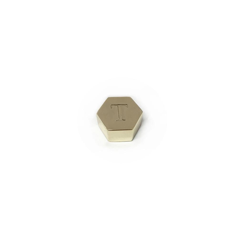Image of Hats. Productname: Letter Cap T in T colour by brand - Olga Berg