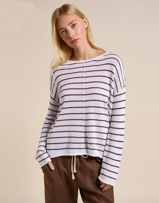 Image of a model wearing Outerwear. Productname: Indi Knit - in White/Chocolate colour by brand - Little Lies