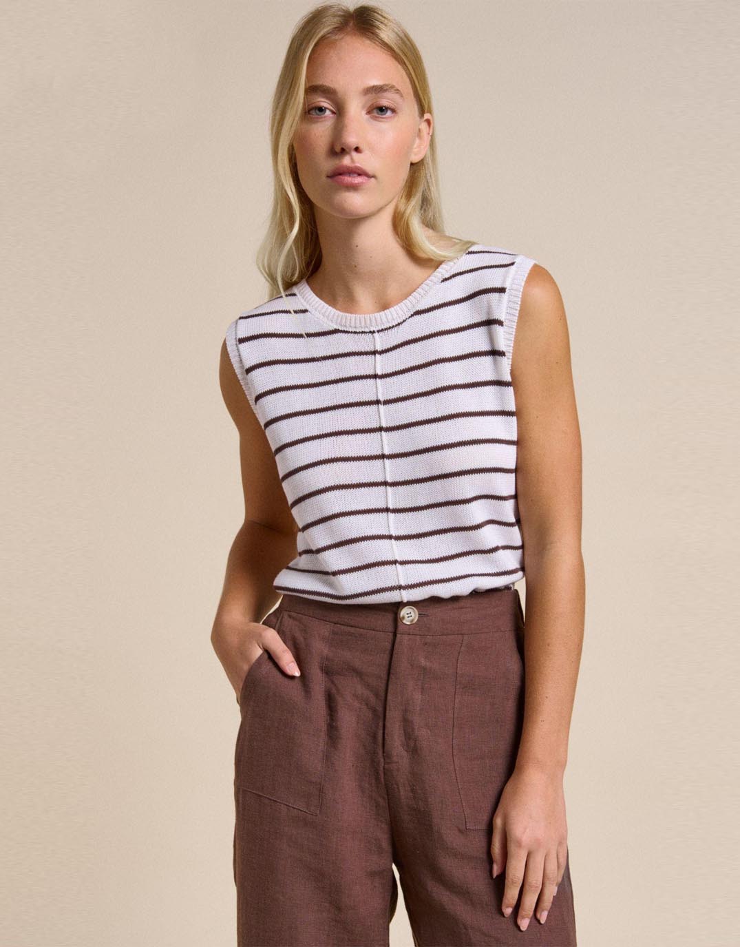 Image of a model wearing Outerwear. Productname: Indi Tank - in White/Chocolate colour by brand - Little Lies