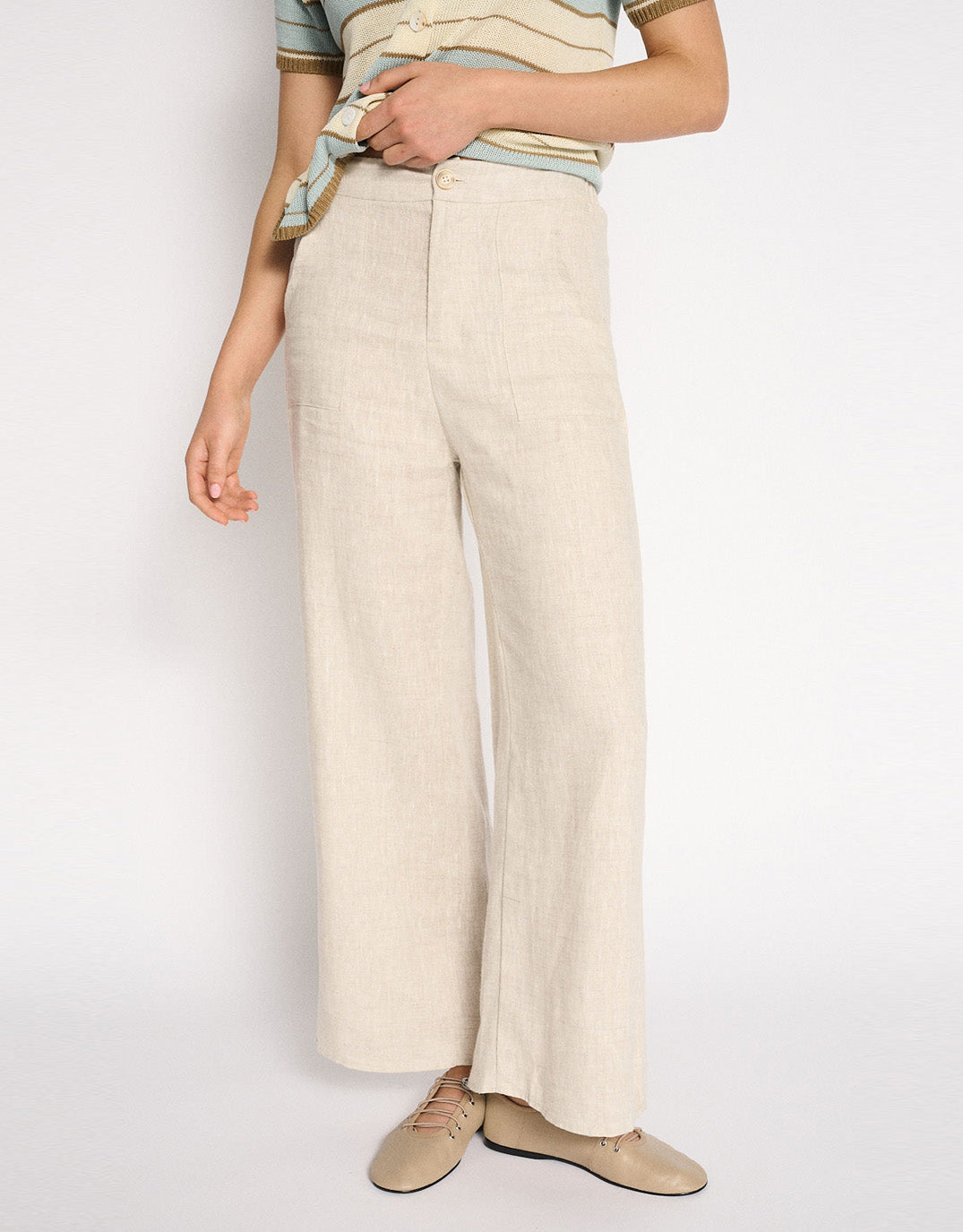 Image of a model wearing Pants. Product name - Jude Wide Leg Linen Pant Natural in Natural colour by brand - Little Lies