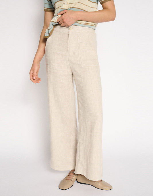 Image of a model wearing Pants. Product name - Jude Wide Leg Linen Pant Natural in Natural colour by brand - Little Lies