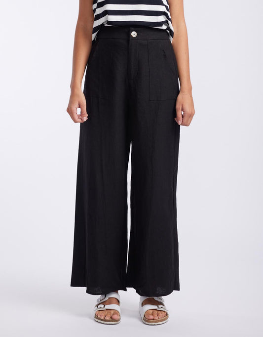 Image of a model wearing Pants. Productname: Jude Wide Leg Linen Pants - in Black colour by brand - Little Lies