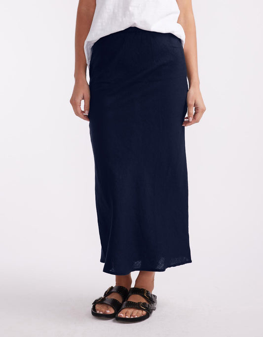 Image of a model wearing Skirts. Productname: Linen Slip Skirt - in Navy colour by brand - Little Lies