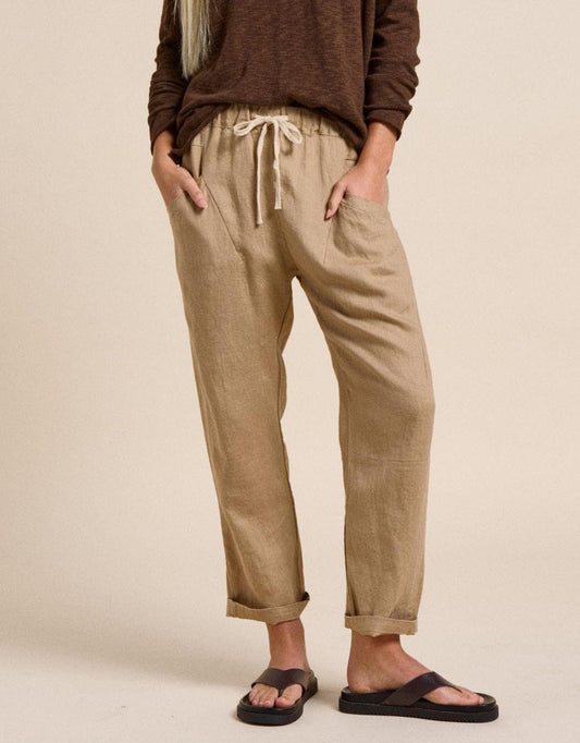 Image of a model wearing Pants. Productname: Luxe Linen Pants - in Camel colour by brand - Little Lies