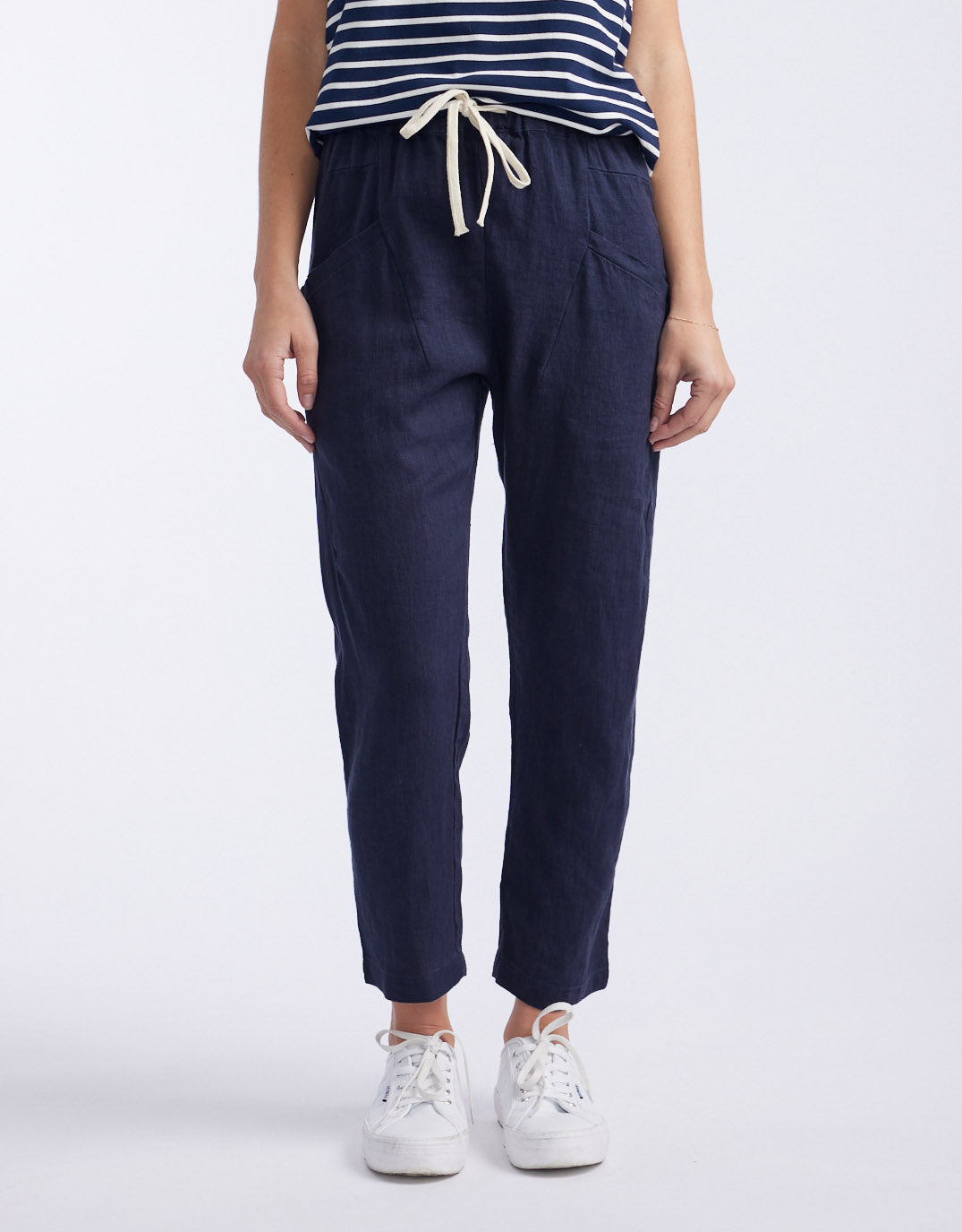 Image of a model wearing Pants. Product name - Luxe Linen Pants French Navy in French Navy colour by brand - Little Lies
