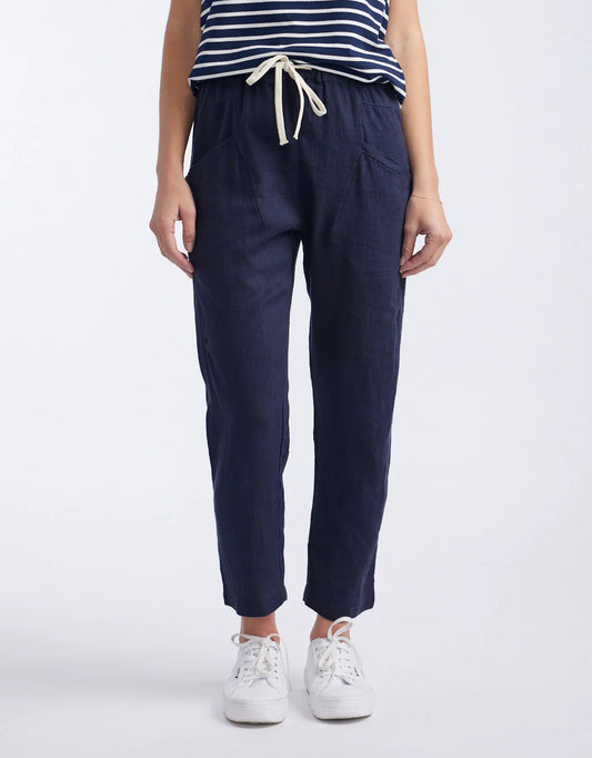 Image of a model wearing Pants. Product name - Luxe Linen Pants French Navy in French Navy colour by brand - Little Lies