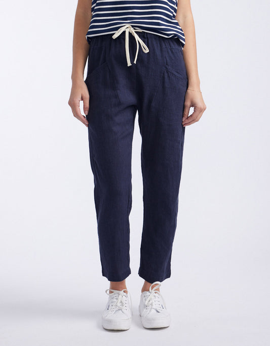 Image of a model wearing Pants. Product name - Luxe Linen Pants French Navy in French Navy colour by brand - Little Lies