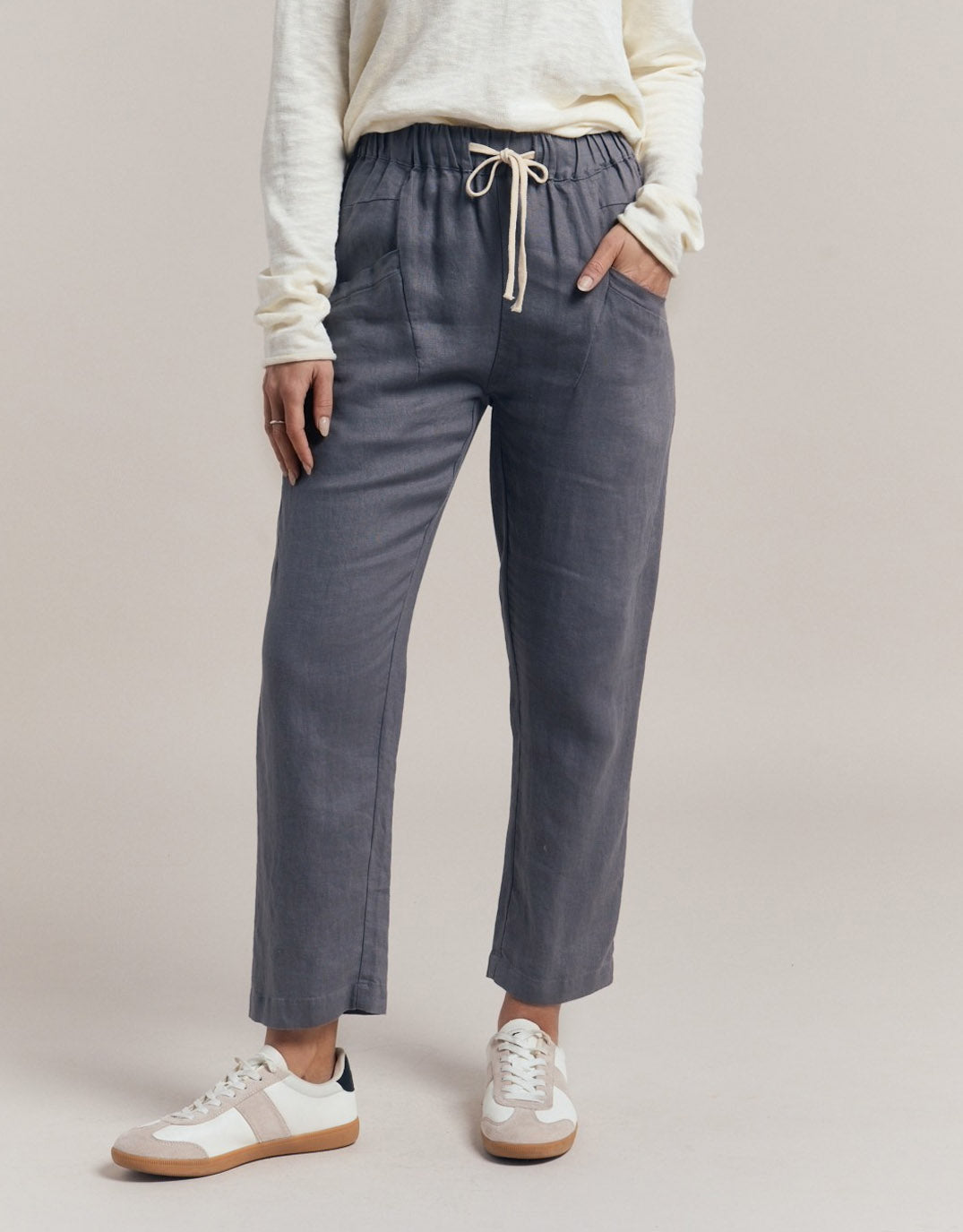 Image of a model wearing Pants. Product name - Luxe Linen Pants Gunmetal Grey in Gunmetal Grey colour by brand - Little Lies
