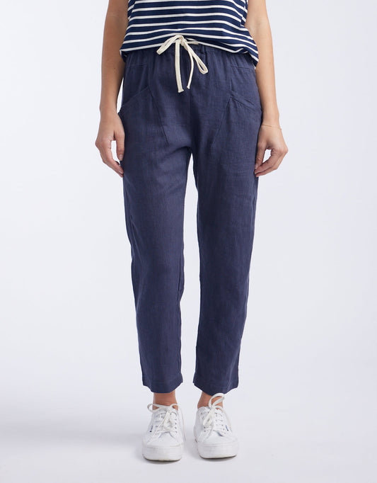 Image of a model wearing Pants. Productname: Luxe Linen Pants - in Washed Navy colour by brand - Little Lies