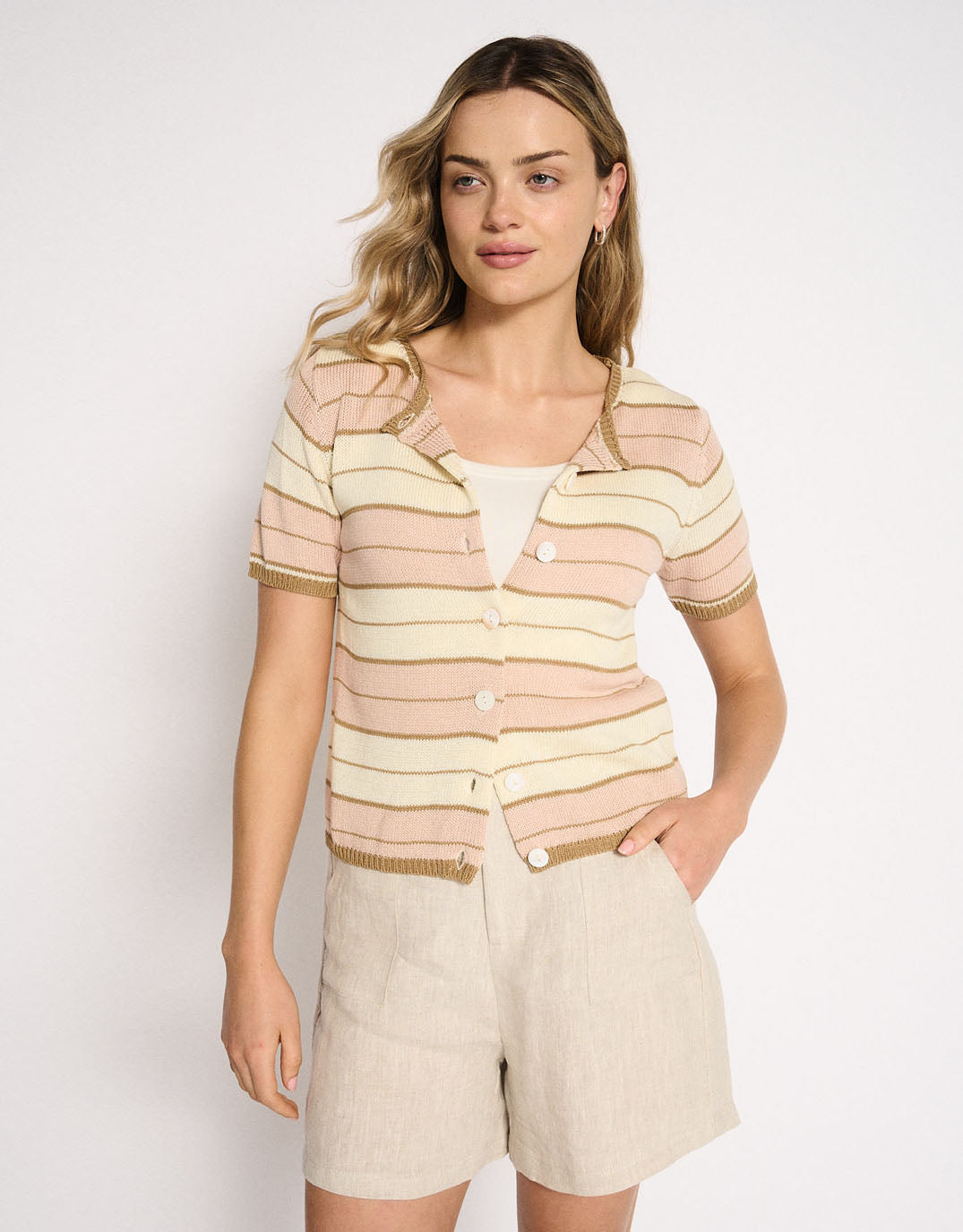 Image of a model wearing Outerwear. Product name - Solene Stripe Button Top Dusty Pink in Dusty Pink colour by brand - Little Lies