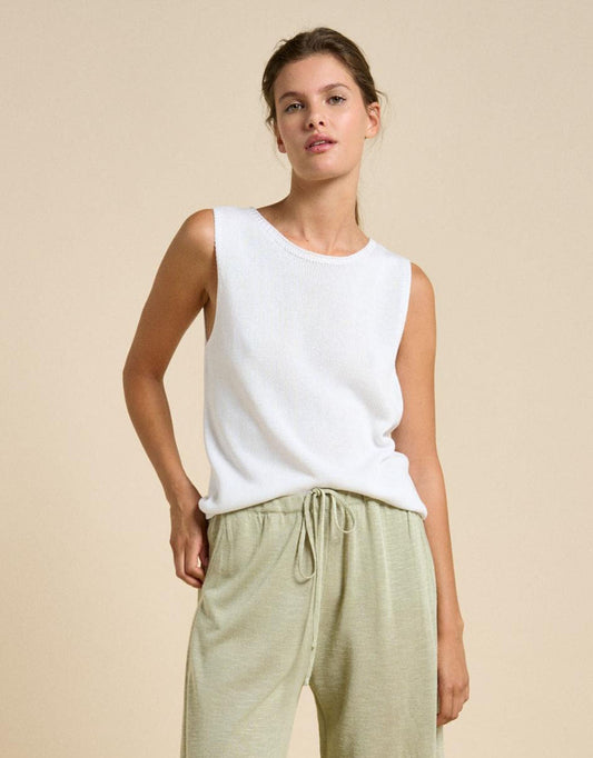 Image of a model wearing Tops. Productname: Spring Tank - in White colour by brand - Little Lies