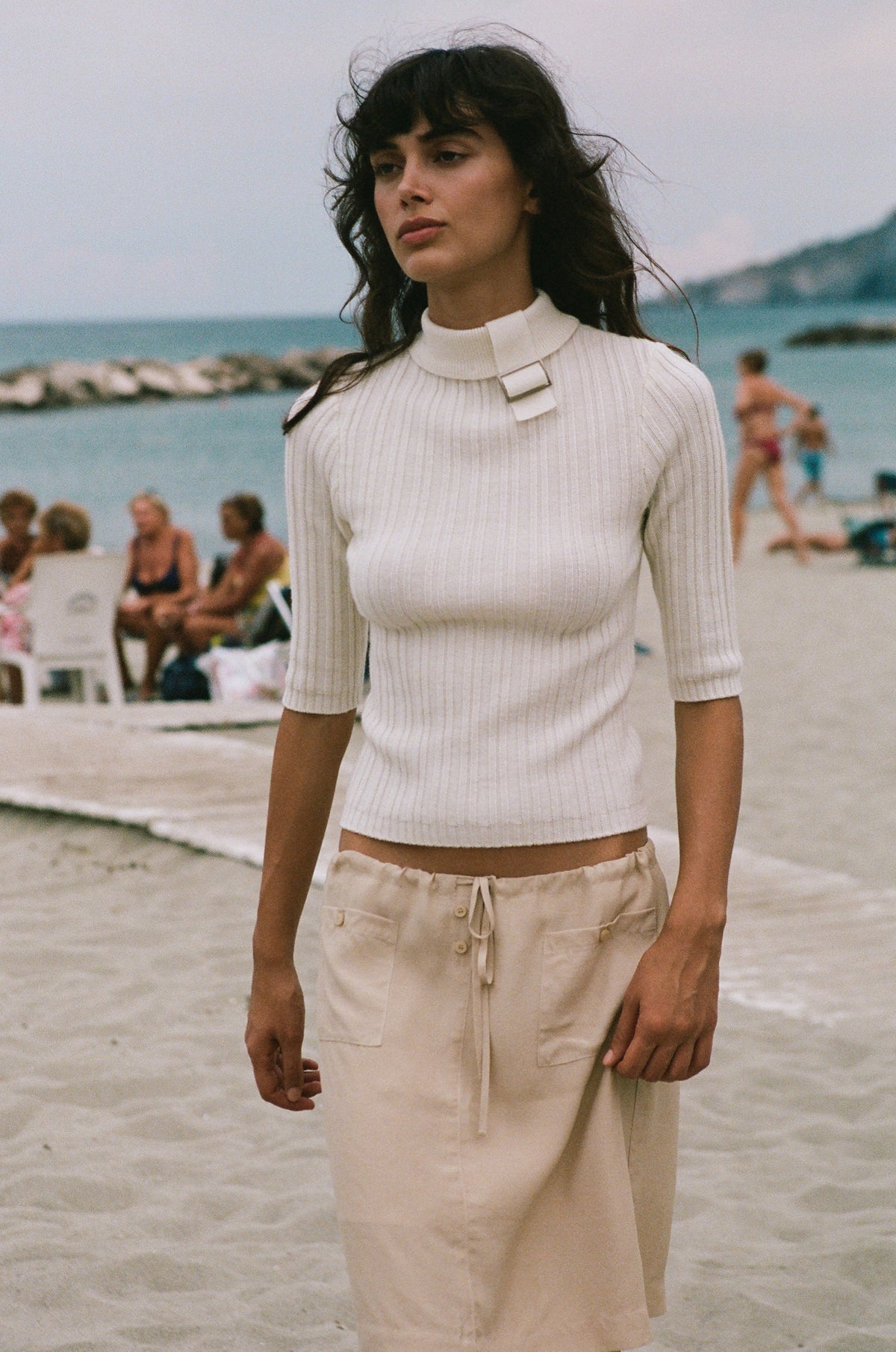 Image of a model wearing Tops. Product name - Lula Top in Off White colour by brand - With Jéan