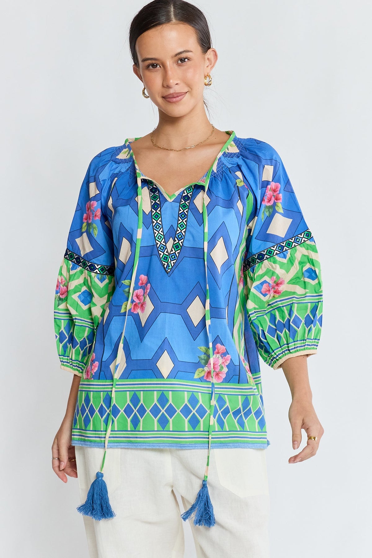 Image of a model wearing Tops. Product name - PRE SLAE | LulaLife Bella Vista Top Blueberry in Blue colour by brand - Lulalife