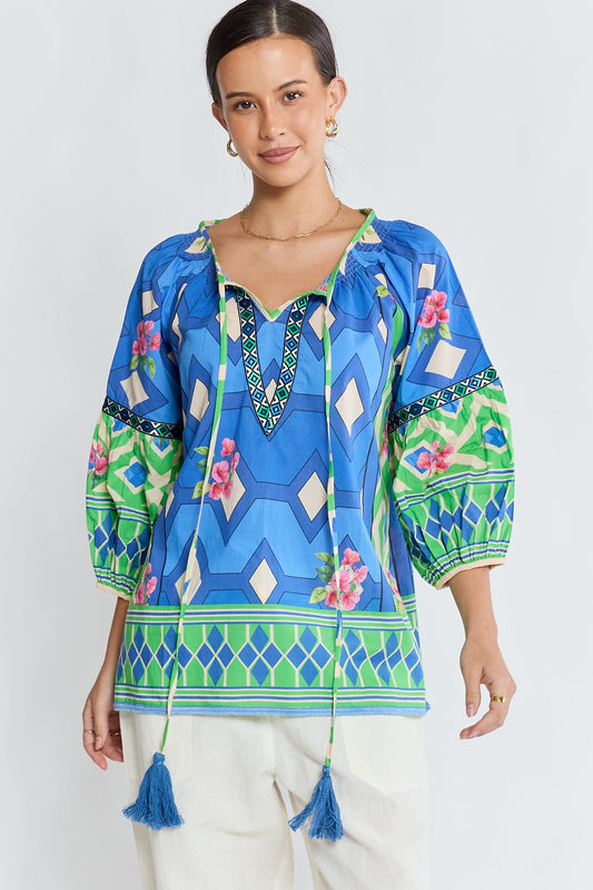 Image of a model wearing Tops. Product name - PRE SLAE | LulaLife Bella Vista Top Blueberry in Blue colour by brand - Lulalife