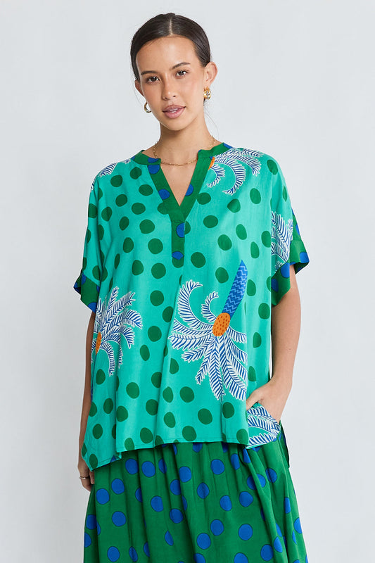 Image of a model wearing Tops. Product name - LulaLife Blanch Tab Top Sea in Sea colour by brand - Lulalife