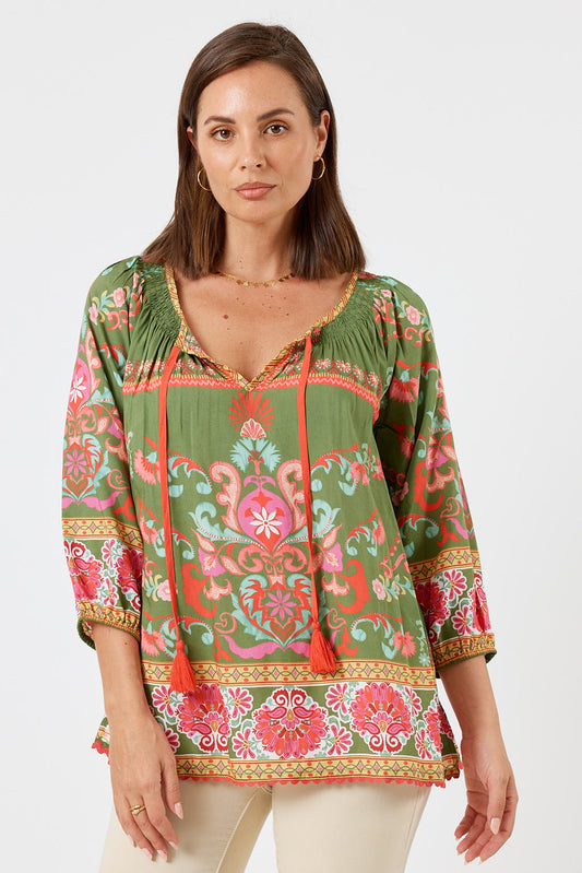 Image of a model wearing Tops. Product name - LulaLife Enid Top Olive in Olive colour by brand - LulaLife