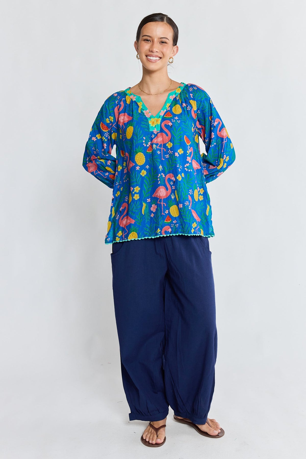 Image of a model wearing Tops. Product name - PRE SALE | LulaLife Flamingo Top Azure in Azure colour by brand - Lulalife