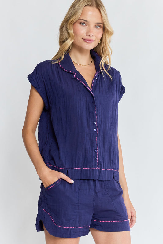 Image of a model wearing Shorts. Product name - LulaLife Florida Short Navy in Navy colour by brand - Lulalife