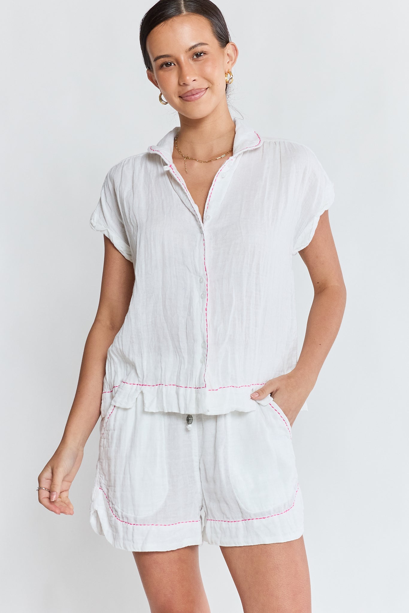 Image of a model wearing Tops. Product name - LulaLife Florida Top White in White colour by brand - Lulalife