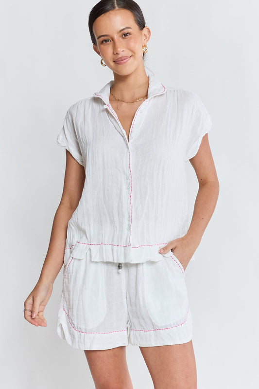 Image of a model wearing Tops. Product name - LulaLife Florida Top White in White colour by brand - Lulalife