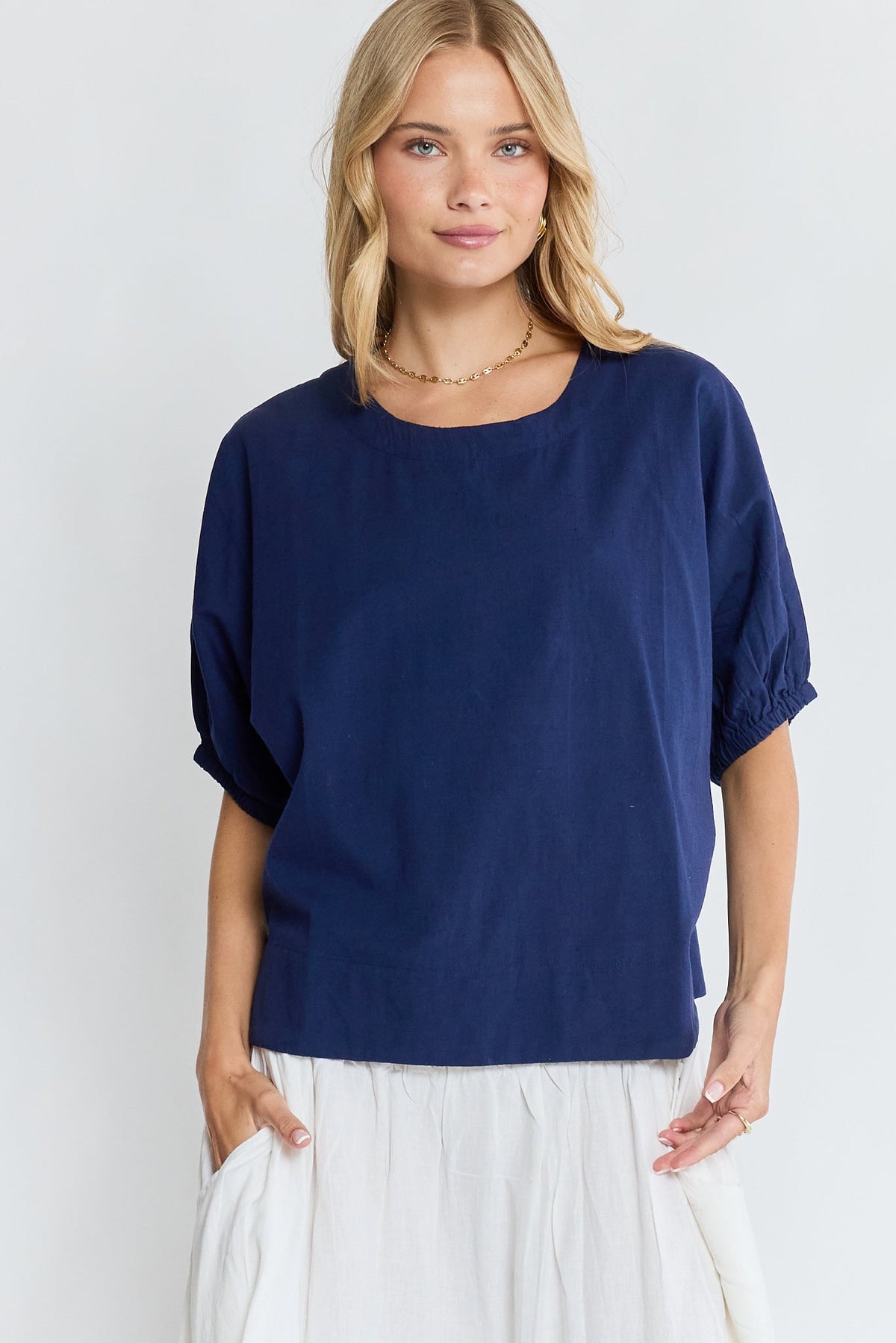 Image of a model wearing Tops. Product name - LulaLife Remi Top Navy in Navy colour by brand - Lulalife