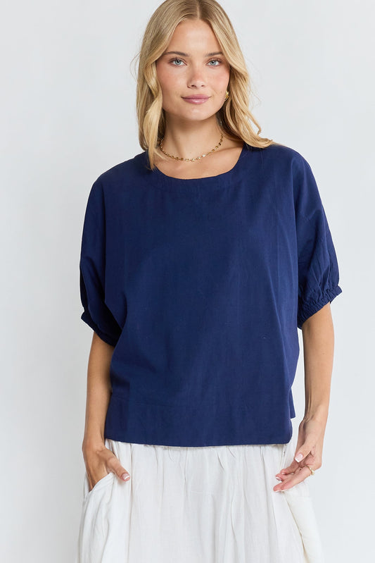 Image of a model wearing Tops. Product name - LulaLife Remi Top Navy in Navy colour by brand - Lulalife