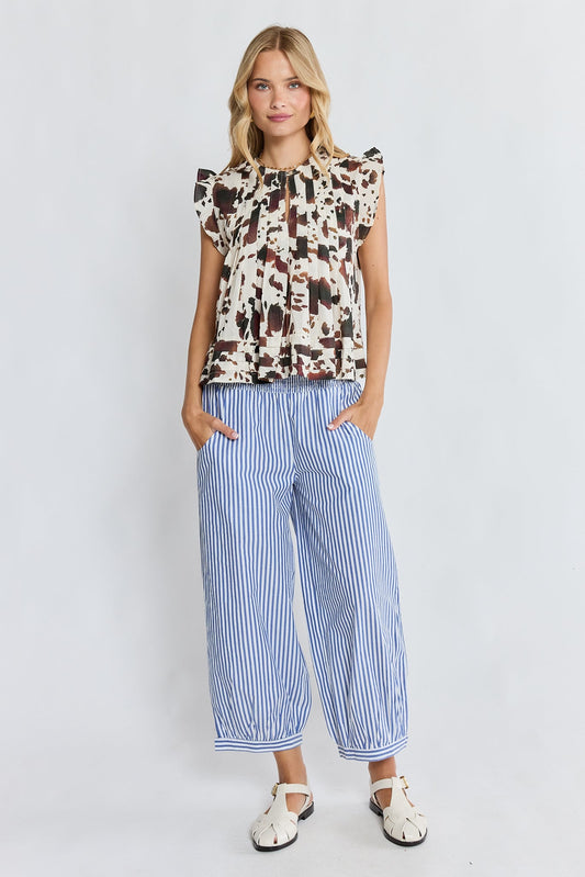 Image of a model wearing Pants. Product name - LulaLife Sylvie Balloon Pant Stripe in Stripe colour by brand - Lulalife