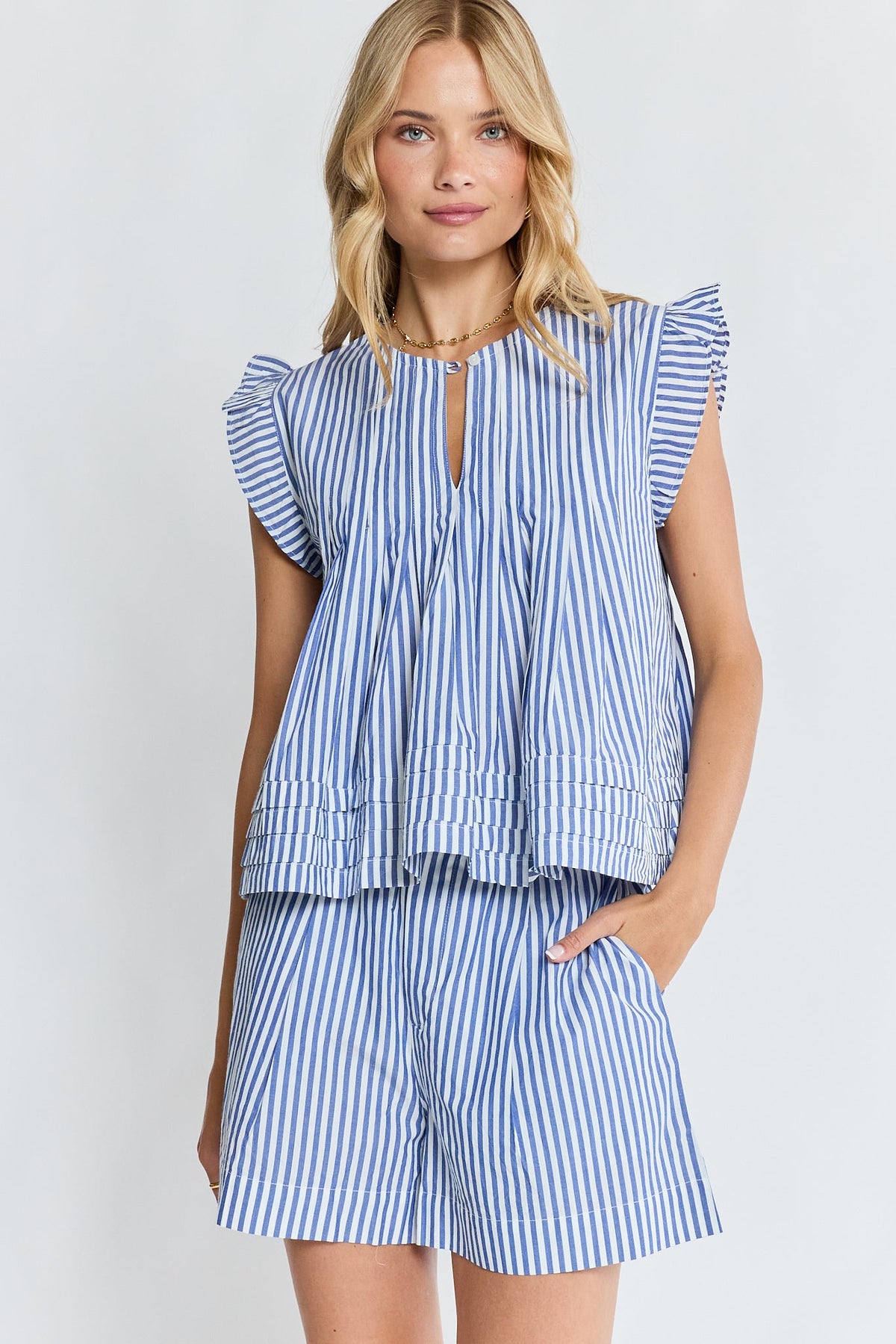 Image of a model wearing Tops. Product name - LulaLife Sylvie Top Stripe in Stripe colour by brand - Lulalife