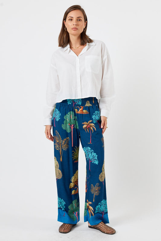 Image of a model wearing Pants. Product name - LulaLife Wanda Pant Navy in Navy colour by brand - LulaLife
