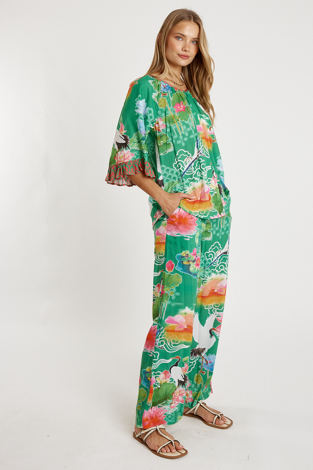 Image of a model wearing Pants. Product name - LulaLife Akiko Pant Sea in Sea colour by brand - LulaLife