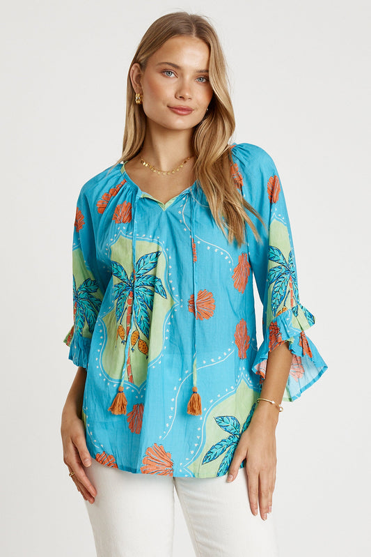 Image of a model wearing Tops. Productname: LulaLife Anaya Top Lagoon in Lagoon colour by brand - LulaLife