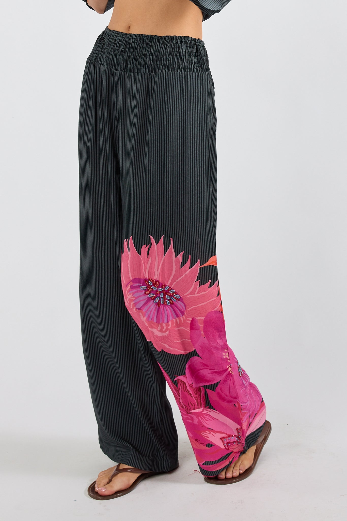 Image of a model wearing Pants. Product name - PRE SALE | LulaSoul Hana Pant Black in Black colour by brand - Lulasoul