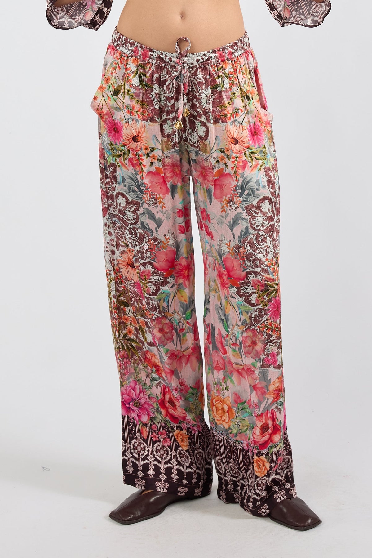 Image of a model wearing Pants. Product name - LulaSoul La Maroma Pant Espresso in Espresso colour by brand - Lulasoul