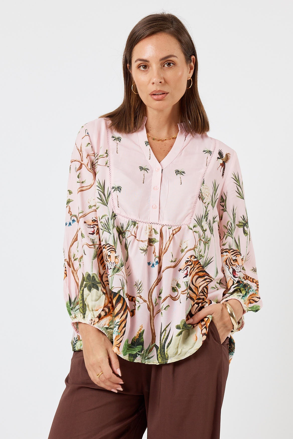 Image of a model wearing Tops. Product name - LulaSoul Samatra Top Orchid in Orchid colour by brand - LulaSoul