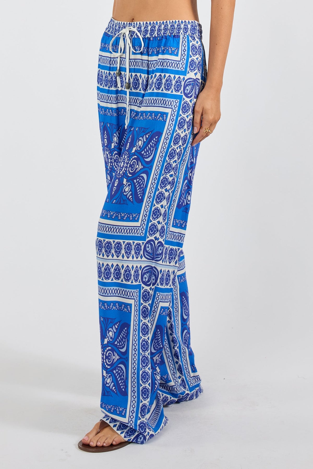 Image of a model wearing Pants. Product name - PRE SALE | LulaSoul Samora Pant Ocean in Ocean colour by brand - Lulasoul