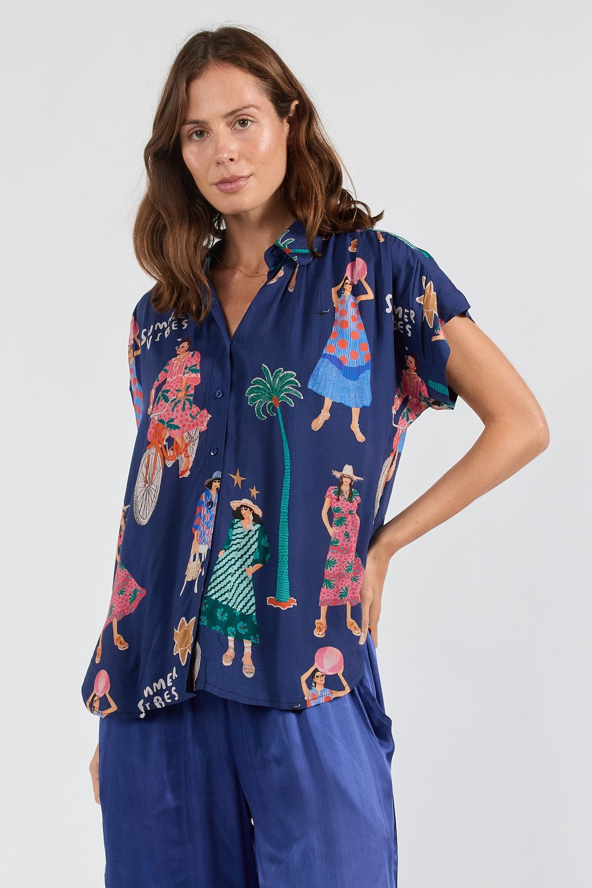 Image of a model wearing Tops. Product name - PRE SALE | LulaSoul Summer Vibes Top Navy in Navy colour by brand - Lulasoul