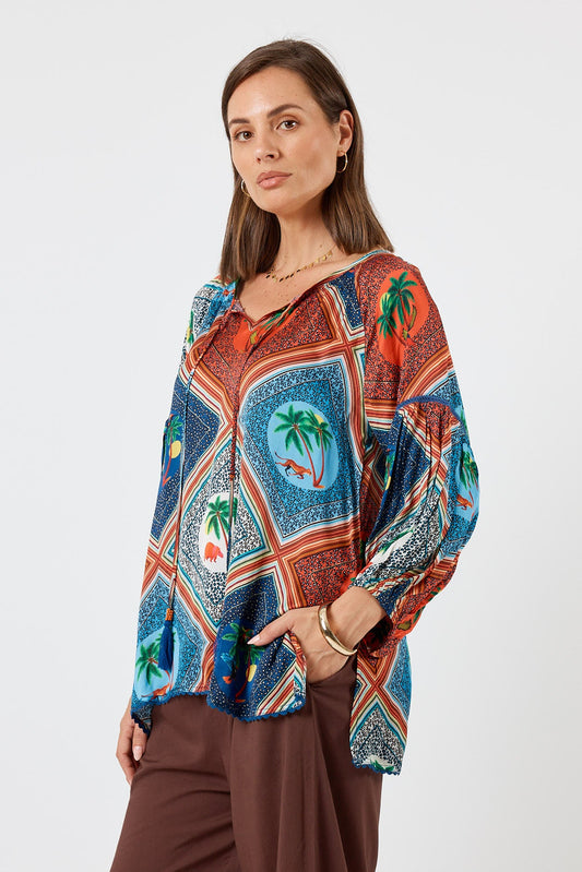 Image of a model wearing Tops. Product name - LulaSoul Windsor Top Ocean in Ocean colour by brand - LulaSoul